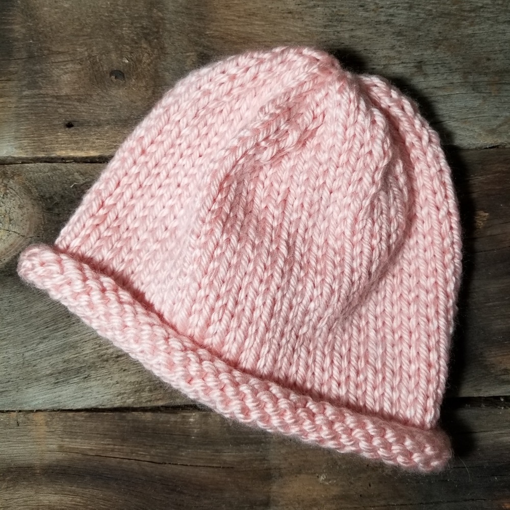 Hand knit hat pink rolled brim
